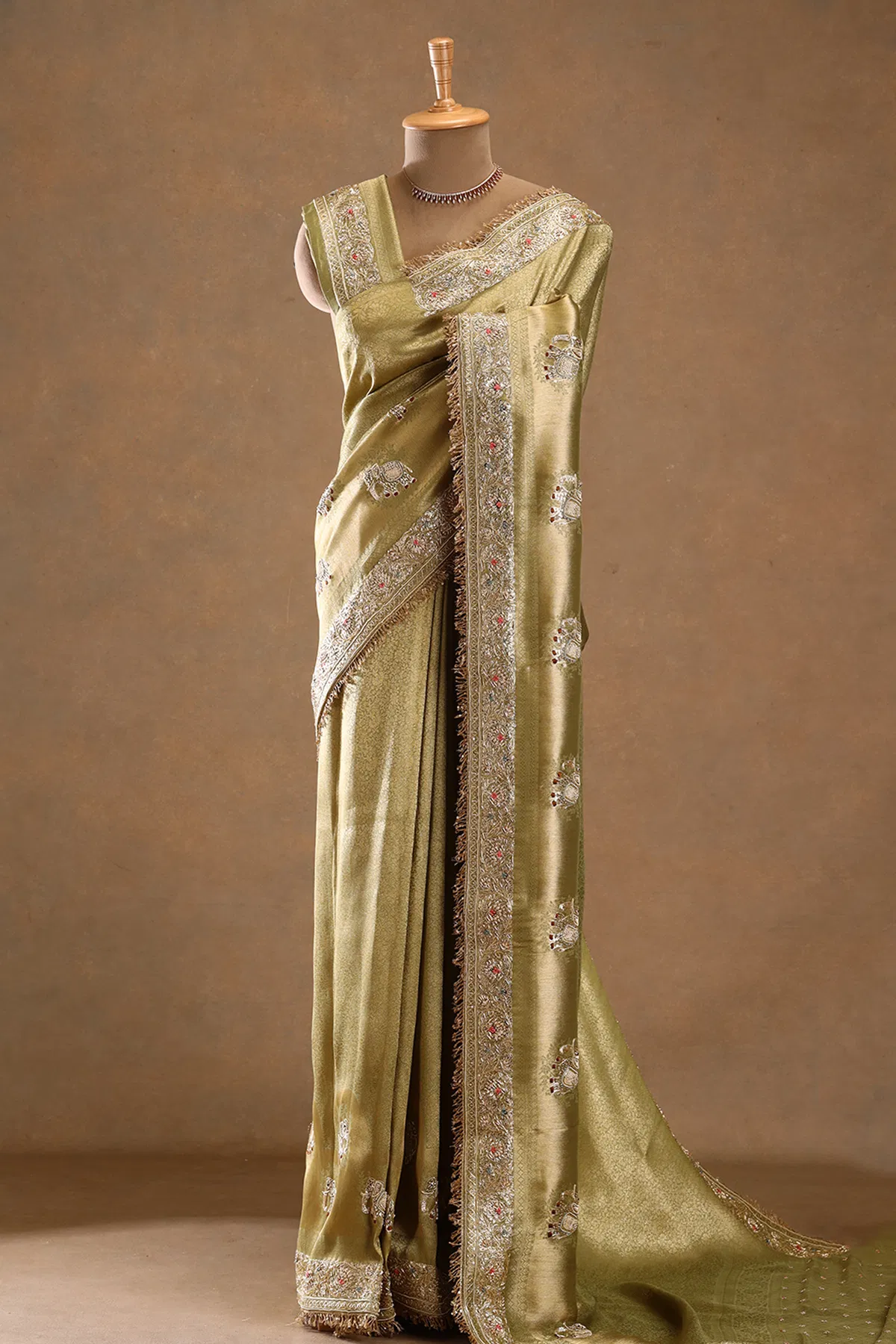 Green zardosi embroidered tissue designer saree
